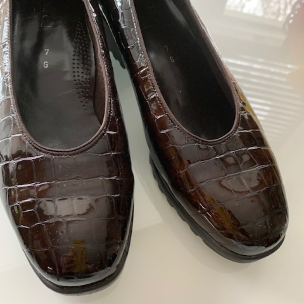 Brown patent leather shoes by Arm